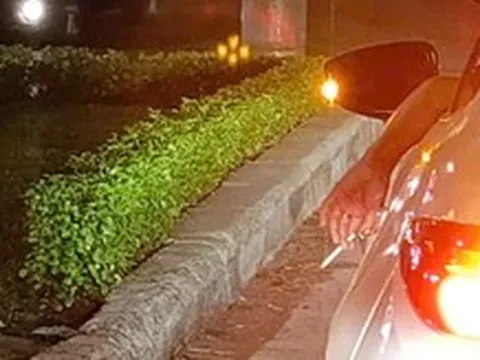 Vừa lái ô tô, vừa phì phèo thuốc lá: Có bị phạt?